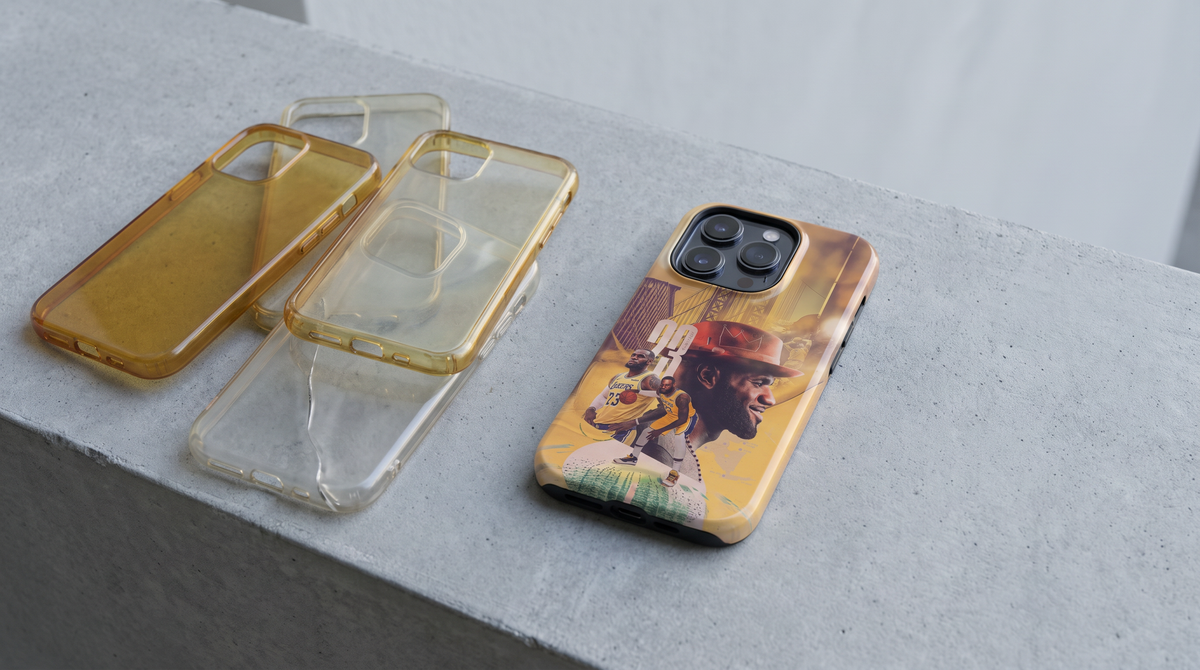 Four worn yellowed clear phone cases beside one clean Casey The Crown tough case, showing what a premium phone case buys